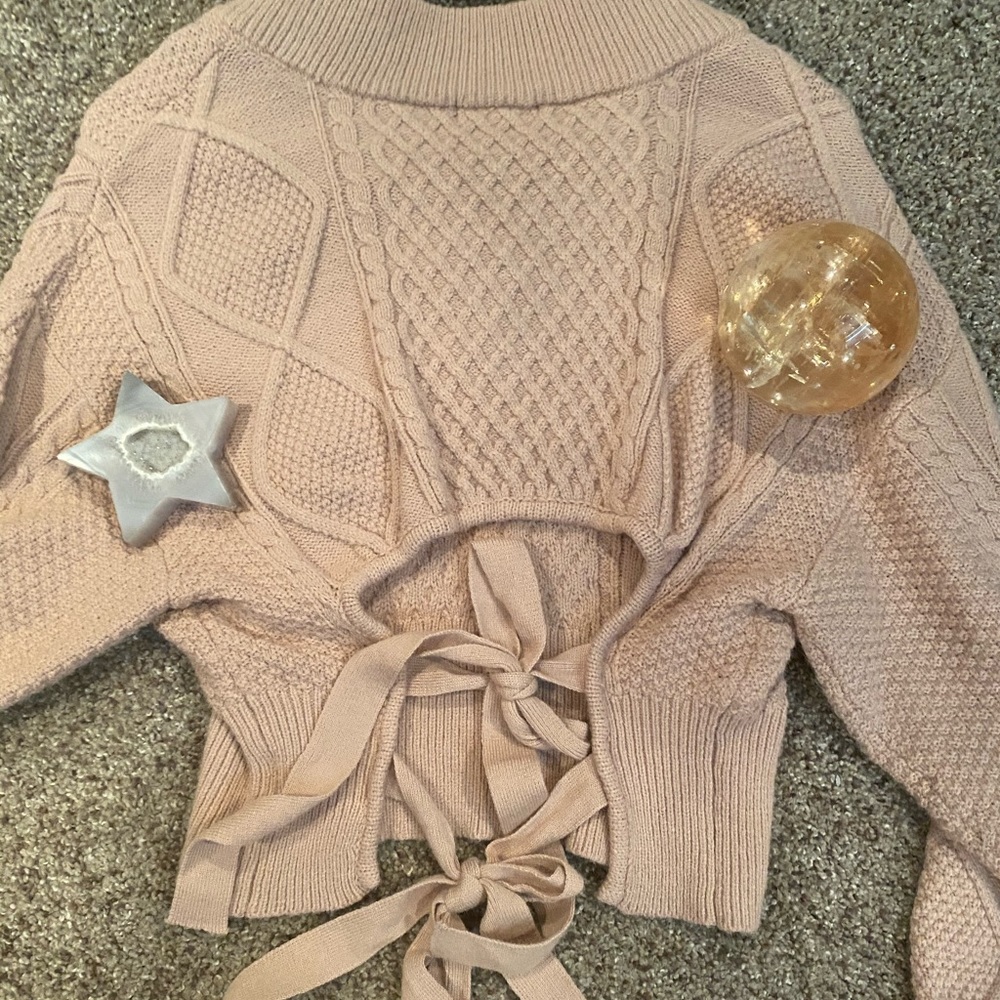 Cropped open back cable knit sweater